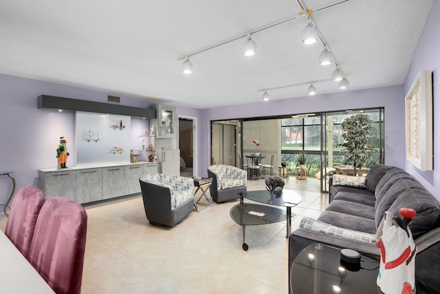 tiled living room with track lighting