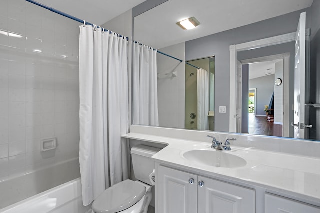 full bathroom featuring vanity, toilet, and shower / bath combo