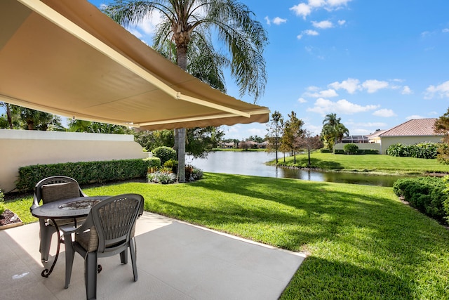 view of patio / terrace with a water view