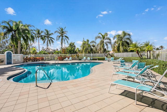 view of swimming pool featuring a patio area