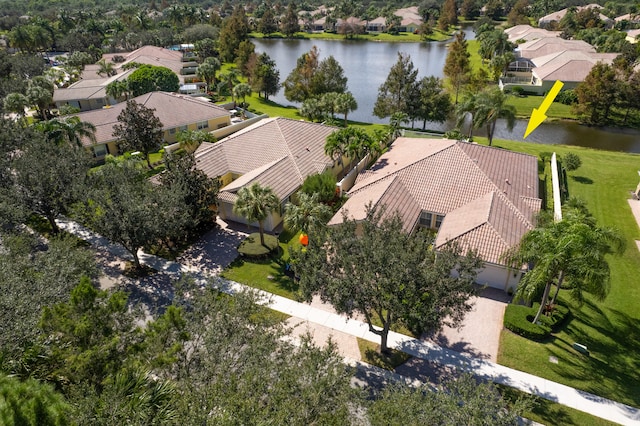 birds eye view of property featuring a water view