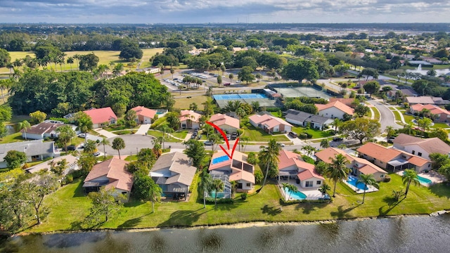 bird's eye view with a water view