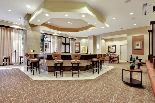 interior space featuring a tray ceiling