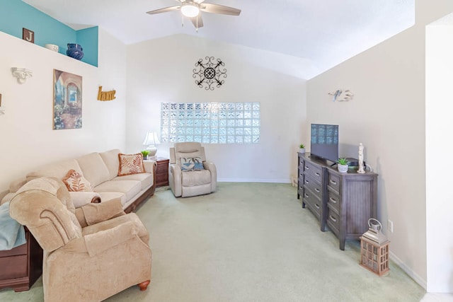 living room with carpet, vaulted ceiling, and ceiling fan