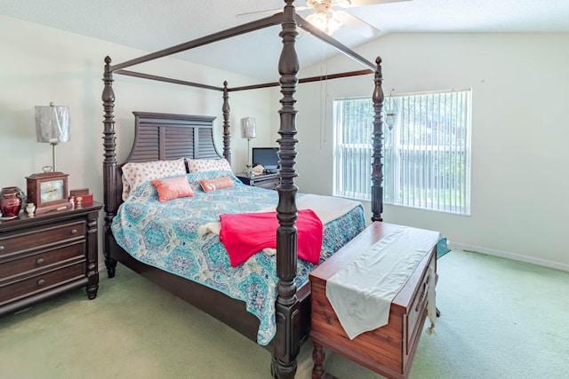 bedroom featuring ceiling fan, light colored carpet, and lofted ceiling