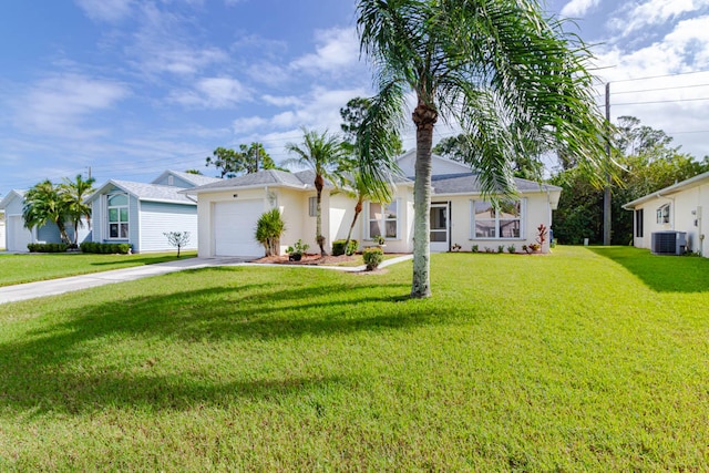 single story home with central AC unit, a garage, and a front yard