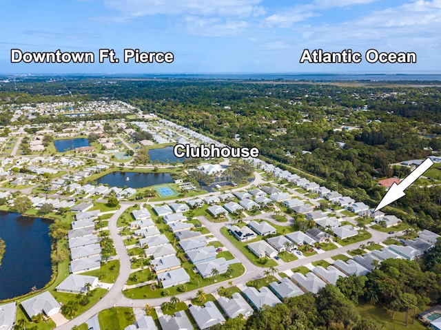 drone / aerial view with a water view