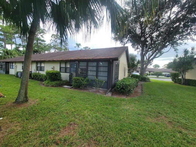 exterior space featuring a lawn