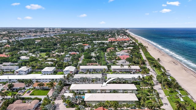 drone / aerial view with a view of the beach and a water view
