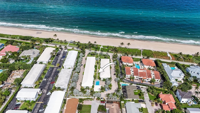 birds eye view of property with a residential view, a view of the beach, and a water view