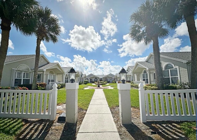 view of community with a yard