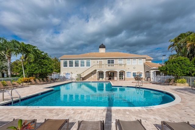 view of pool featuring a patio