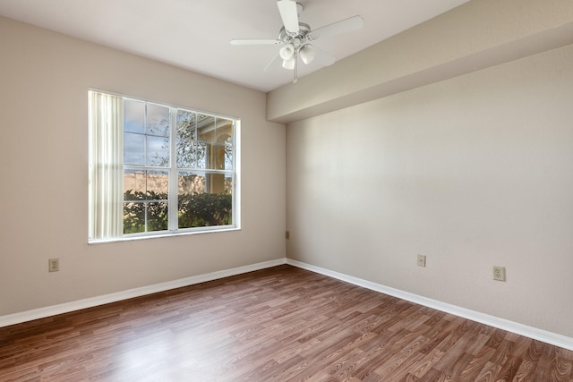 unfurnished room featuring ceiling fan and wood-type flooring