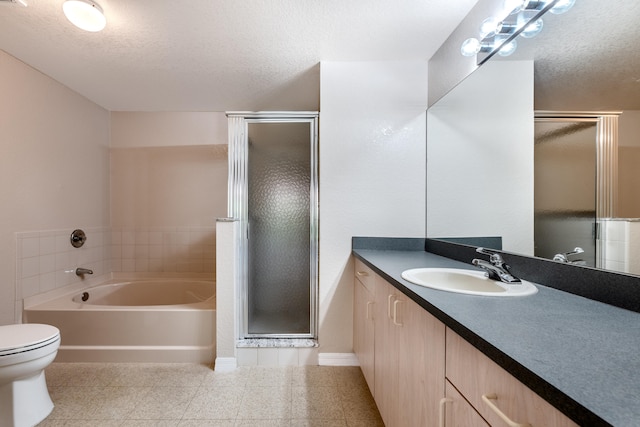 full bathroom with vanity, plus walk in shower, a textured ceiling, and toilet