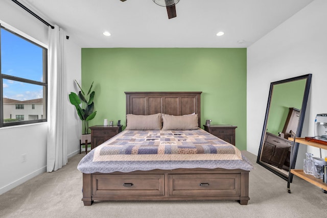 bedroom featuring recessed lighting, baseboards, ceiling fan, and light colored carpet