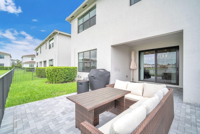 view of patio with an outdoor hangout area and a grill