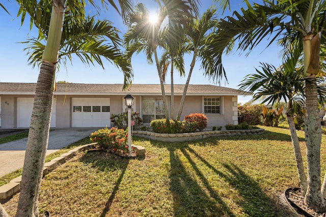 ranch-style house with a front yard and a garage