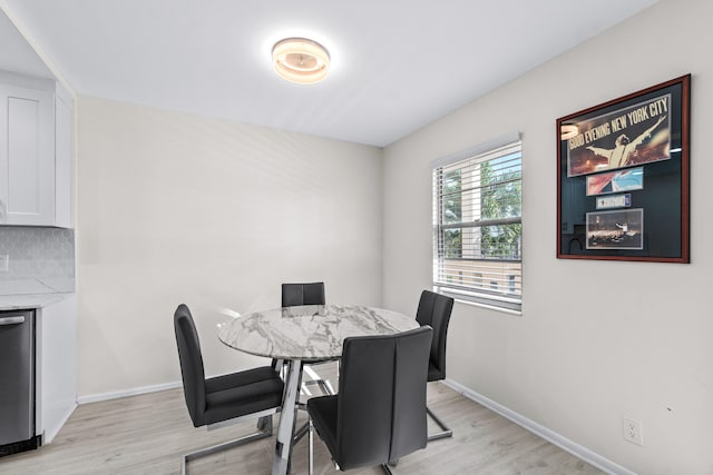 dining room with light hardwood / wood-style floors