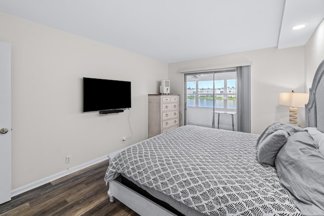 bedroom featuring dark wood-type flooring