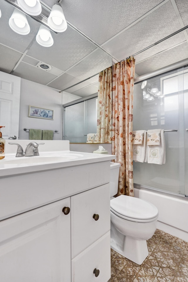 full bathroom with vanity, shower / tub combo with curtain, toilet, and tile patterned floors