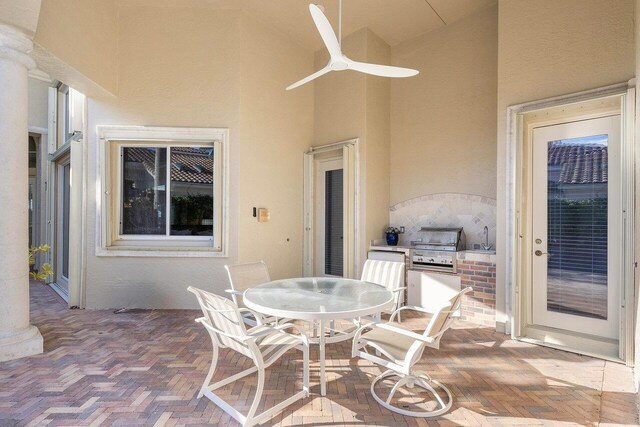 view of patio / terrace with area for grilling and sink