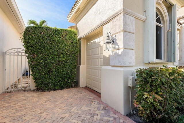 property entrance with a garage