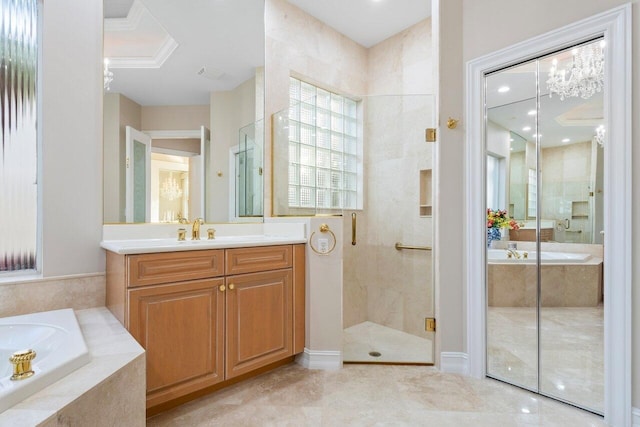 bathroom featuring shower with separate bathtub and vanity