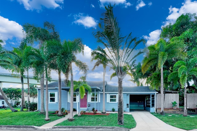 ranch-style home with a front yard