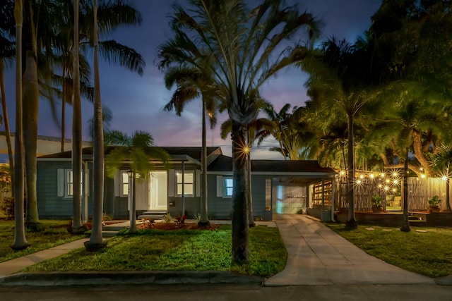 view of front of house with a lawn