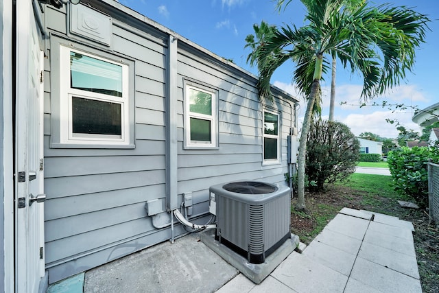 view of home's exterior with central AC unit