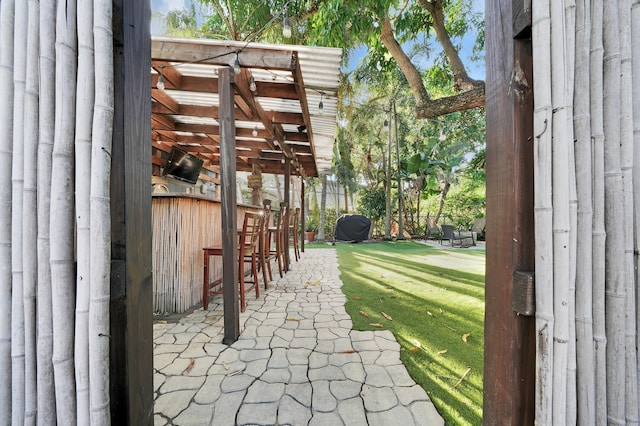 view of patio featuring a bar