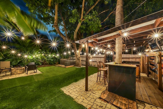 view of yard with a patio and an outdoor bar