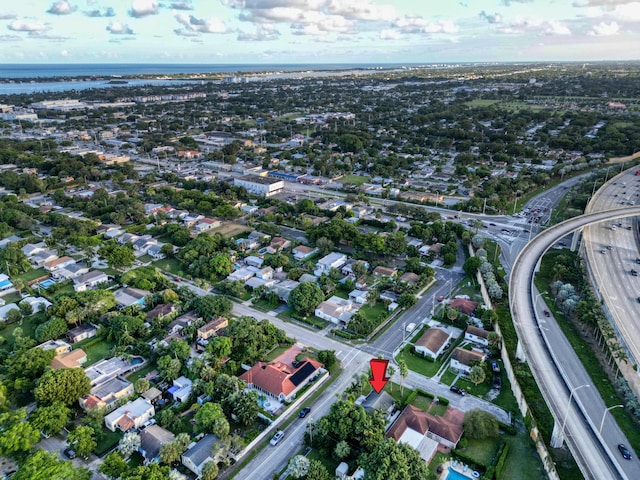 drone / aerial view featuring a water view