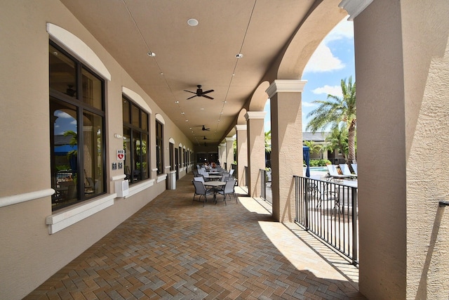 view of patio with ceiling fan