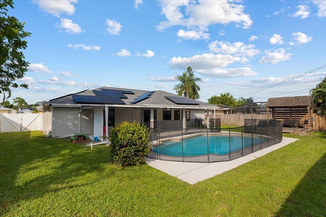 view of pool featuring a patio area and a lawn