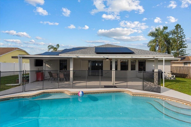 view of pool featuring a patio