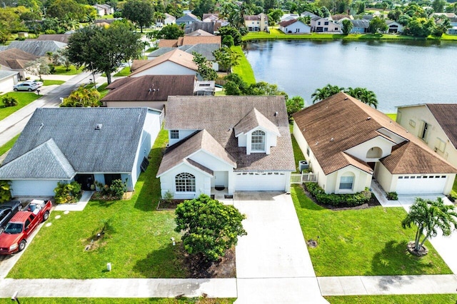 drone / aerial view featuring a water view