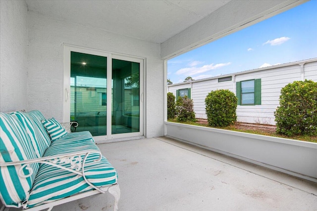 balcony featuring a patio area