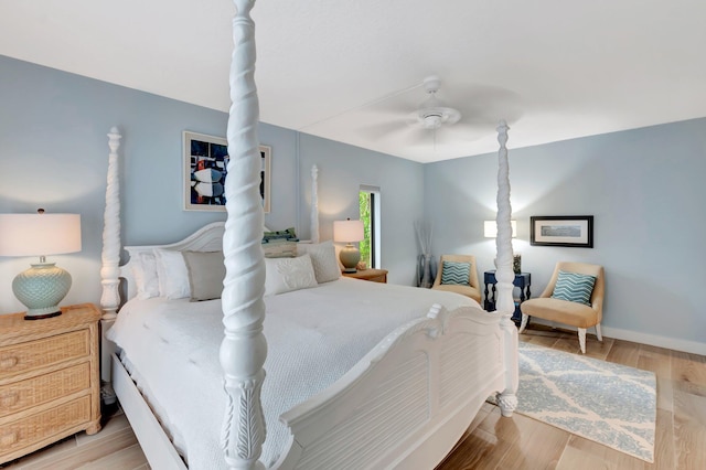 bedroom with light hardwood / wood-style flooring and ceiling fan