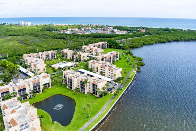 bird's eye view with a water view