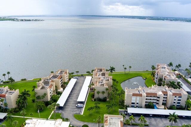 birds eye view of property featuring a water view