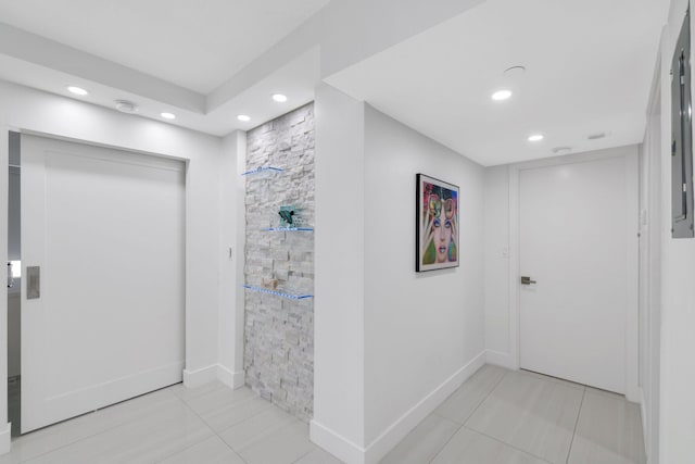 full bathroom featuring tile patterned flooring, tiled shower, baseboards, and recessed lighting