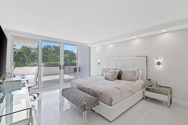 bedroom featuring light tile patterned flooring, recessed lighting, baseboards, access to outside, and a wall of windows