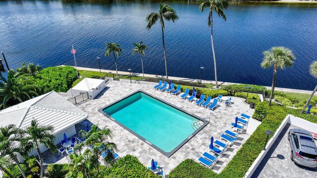 birds eye view of property featuring a water view