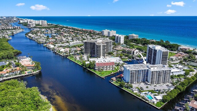 bird's eye view featuring a water view and a city view