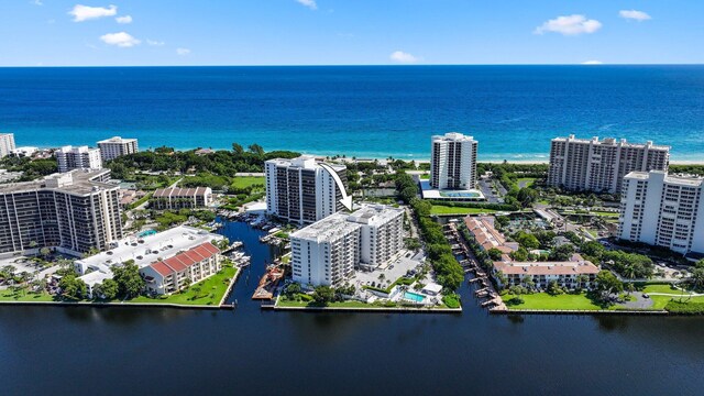 aerial view featuring a water view and a city view