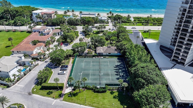 aerial view featuring a view of the beach and a water view