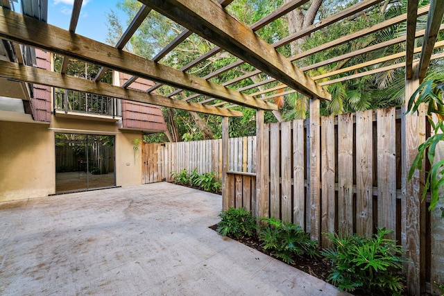 view of patio featuring a pergola