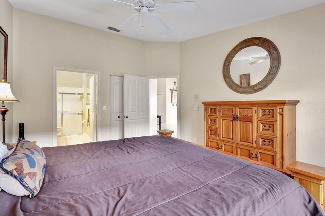 bedroom with connected bathroom and ceiling fan