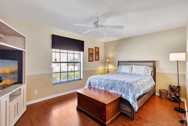 bedroom featuring ceiling fan and hardwood / wood-style floors